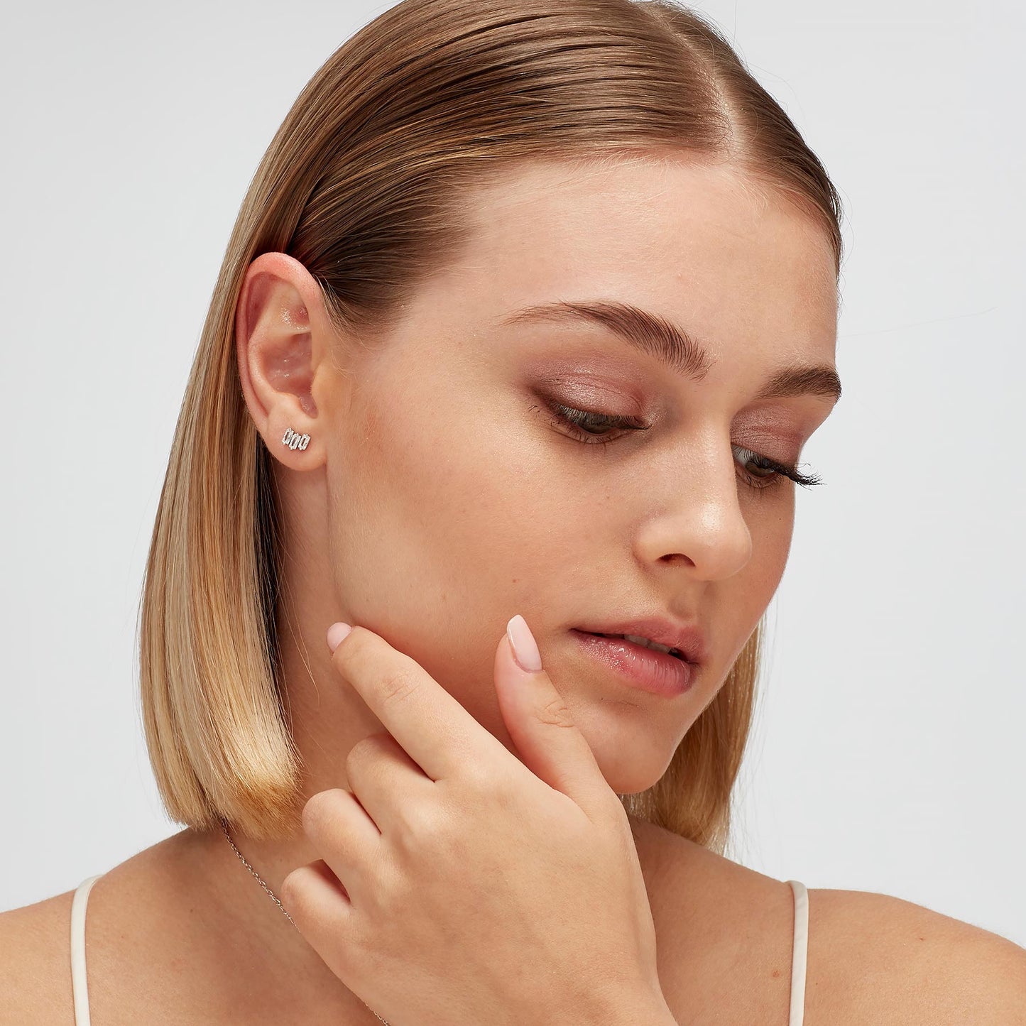 Pendiente de botón individual Fancy baguette circonita cúbica.